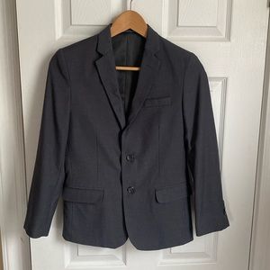 Calvin Klein charcoal suit blazer size 12 with pockets in good condition